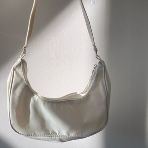 White purse— brand new in wrapping with barcode
